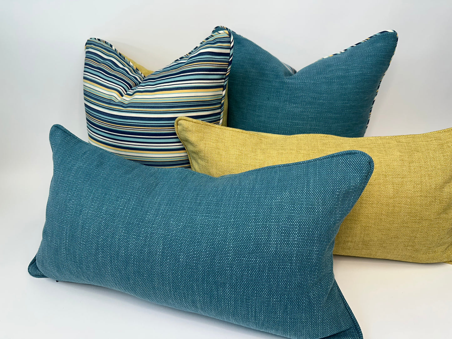 Teal Trio-Lumbar and Pair of Reversible 18" x 18" Accent Cushions